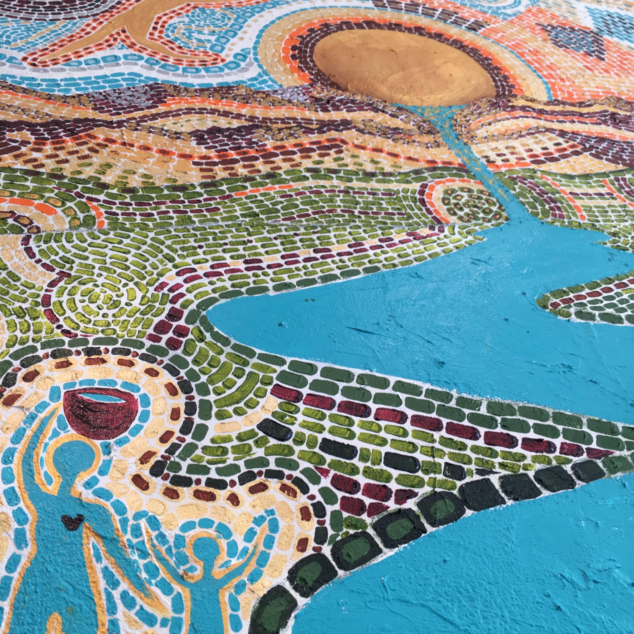 katy-gennaro-painting-mosaic-river-sun-detail Detail of Katy Gennaro painting Returning showing mosaic marks along a turquoise river and a figure raising a cup